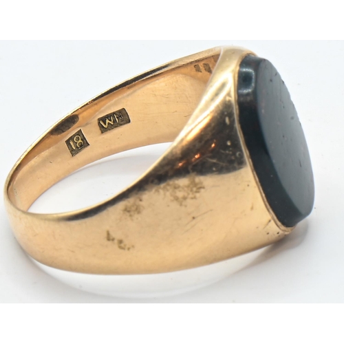 270 - 18ct gold and bloodstone ring, stamped 18 and with maker's marks, size P, gross weight 7.19 grams... 