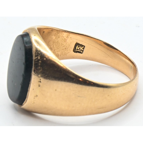 270 - 18ct gold and bloodstone ring, stamped 18 and with maker's marks, size P, gross weight 7.19 grams... 