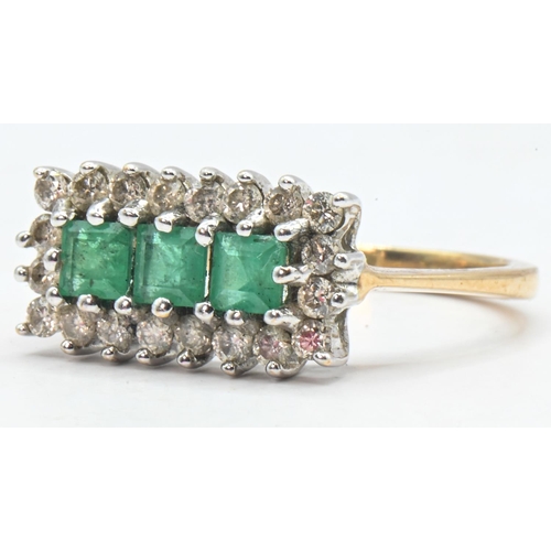 273 - 9ct gold, emerald and diamond cluster ring convention mark, size K, gross weight 2.19 grams... 