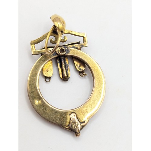 278 - Yellow metal fob seal with gold plated chain and a scrap yellow metal stone set pendant, approximate... 