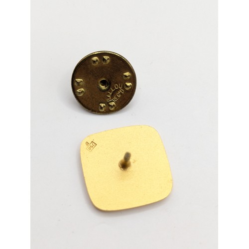 197A - Two Huguenin Frères 'Titlis' pin badges, comprising: an 18ct gold stamped verso '750 HF,'  4.95 gram... 