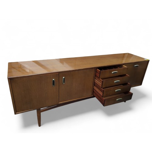 1 - G-Plan sideboard with 4 drawers, 1 cupboard and 1 drinks cabinet. W206cm D46cm H79cm.