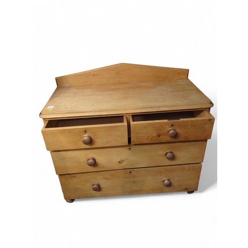 4 - Strip pine 2 over 2 chest of drawers with rear gallery. Locks to each drawer but no key. W104cm D49c... 