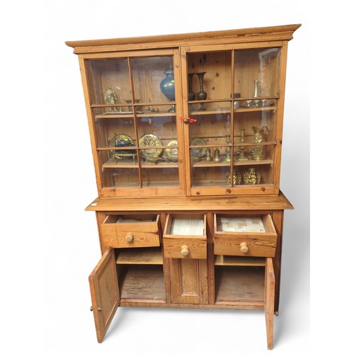 9 - Pine glazed dresser with three drawers and three cupboards, missing one glazing unit L141 x D47 x H1... 