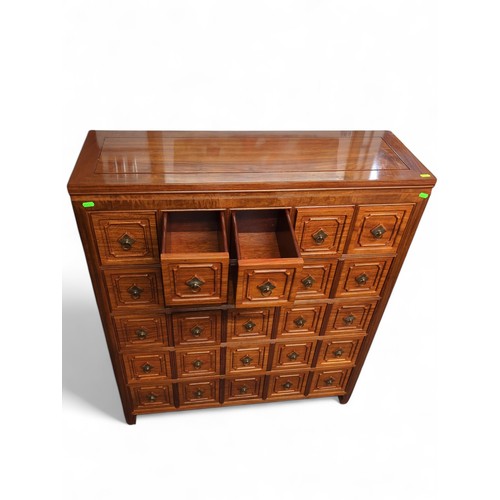 10 - Chinese rosewood multi drawer unit, comprising 25 small drawers with brass drop handles W90 x D31 x ... 