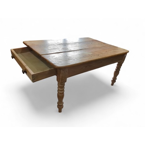 30 - Large C.19th pine farmhouse table with full width drawers to either end and balustrade legs. W112cm ... 