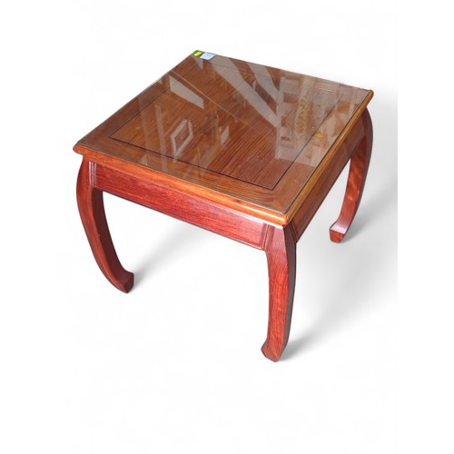 45 - Rosewood glass-topped coffee table. W55cm L55cm H57cm.