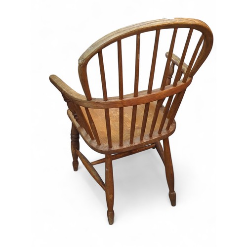 52 - Elm and oak stick back Windsor chair. W59cm.