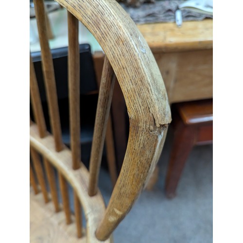 52 - Elm and oak stick back Windsor chair. W59cm.