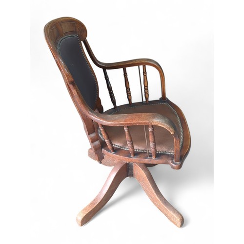 54 - Early C.20th American oak office chair. Marked H.B.& W. CO. XY. Swivel and height adjustable.