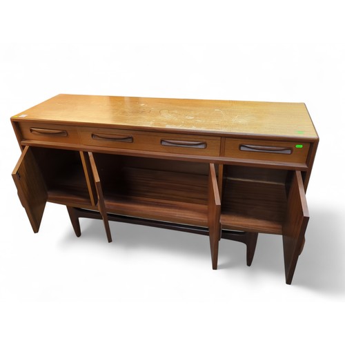 60 - Mid century teak G Plan sideboard with four drawers over four cupboards L155 x D45 x H86cm