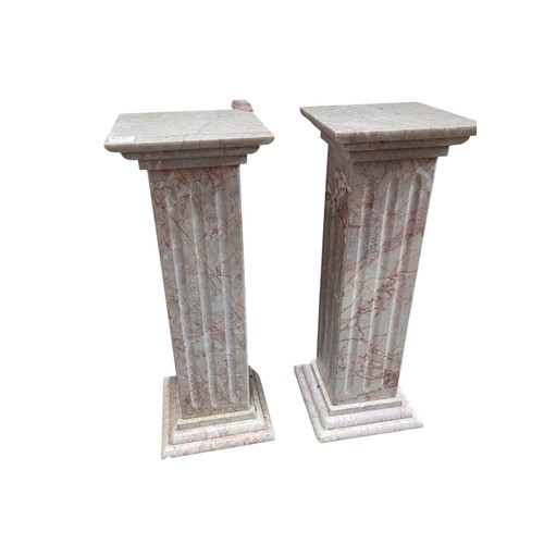 810 - Pair of marble plinths. W26cm D26cm H70cm.