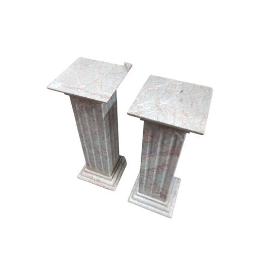 810 - Pair of marble plinths. W26cm D26cm H70cm.