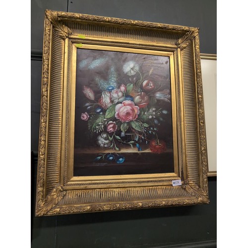 542 - Oil on board of a floral still life in an ornate gilt frame, unsigned, 62 x 71cm