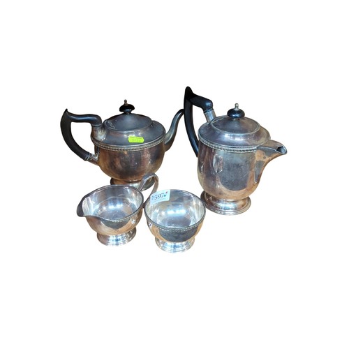 597 - Silver plated hot water pot, tea pot, milk jug and sugar bowl