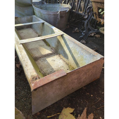 321 - Small galvanised trough feeder. W90cm