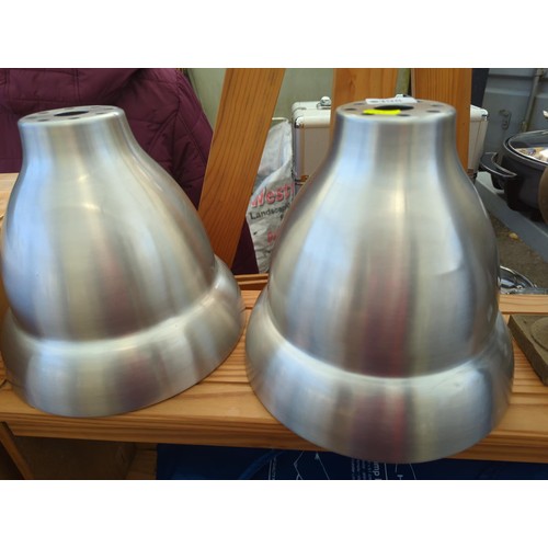 100 - Pair of stainless effect lamp shades. H25cm.