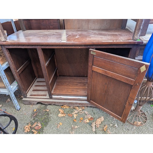 387 - Old Charm sideboard with central cupboard. W126cm D45cm H84cm.