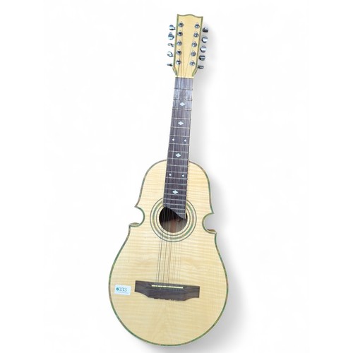 625 - 10-string Puerto Rican Cuatro semi-acoustic guitar in hard case.