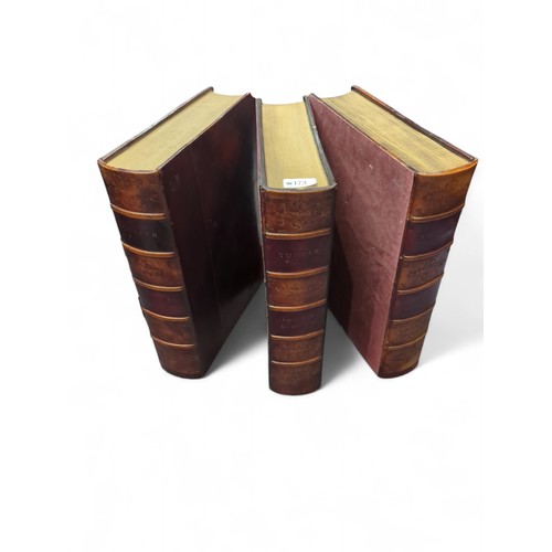 668 - Three large decorative faux books, W30 x L39 x D9cm each