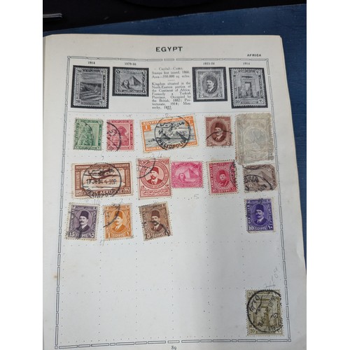 671 - Part filled album of used world stamps