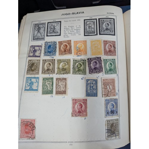 671 - Part filled album of used world stamps