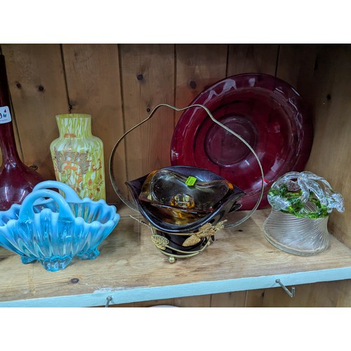 779 - Assorted coloured glass on shelf