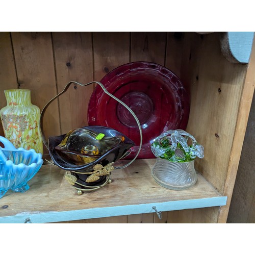 779 - Assorted coloured glass on shelf