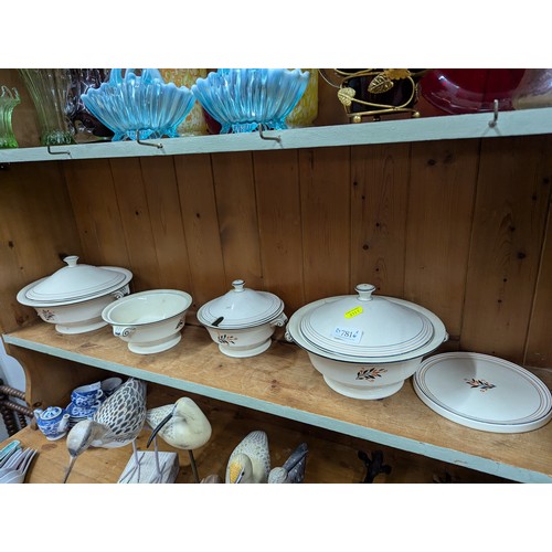 781 - Pair of Minton sauce tureens, pair of tureens and circular stand, one sauce tureen missing cover