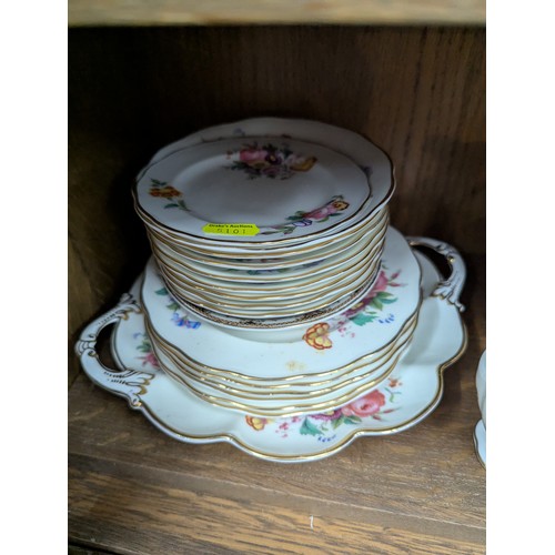 792 - Crescent tea service for eight with two cream jugs, six side plates and a cake plate