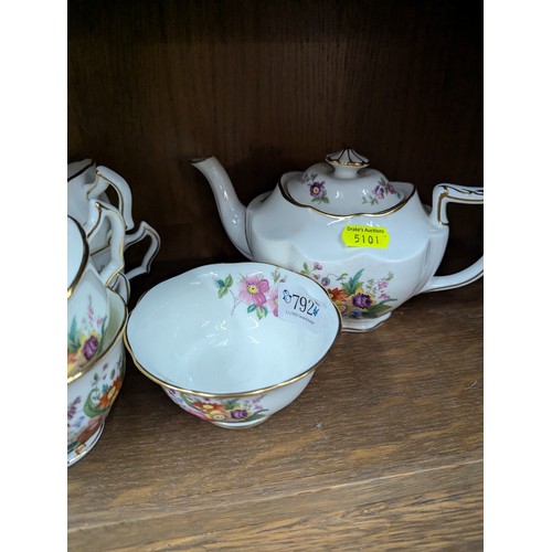 792 - Crescent tea service for eight with two cream jugs, six side plates and a cake plate