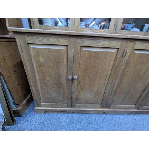 793 - Large oak and oak veneered displat cabinet with two pairs of glazed doors above two pairs of cupboar... 