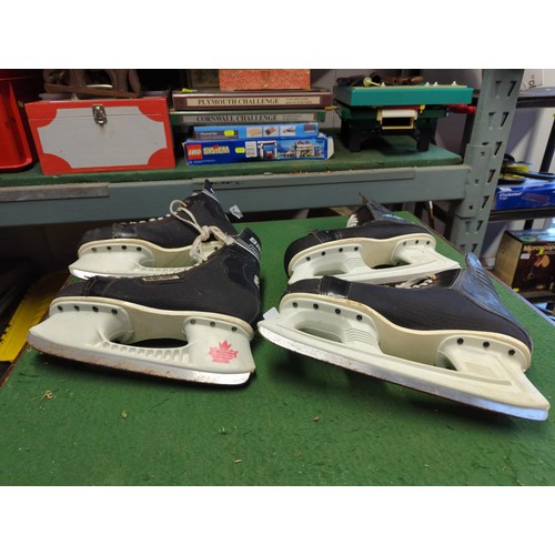 112 - 2 pairs of Bauer ice skates size 8.