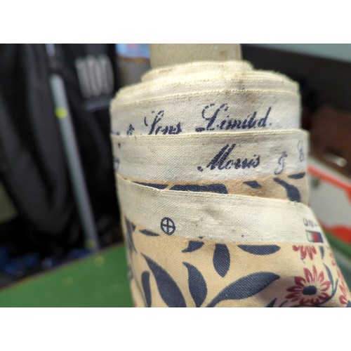 125 - 2 rolls of fabric (unknown lengths). 