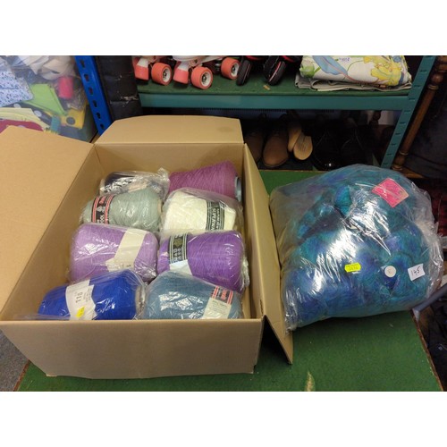 145 - 2 boxes and 2 bags of variously-sized wool and yarn.