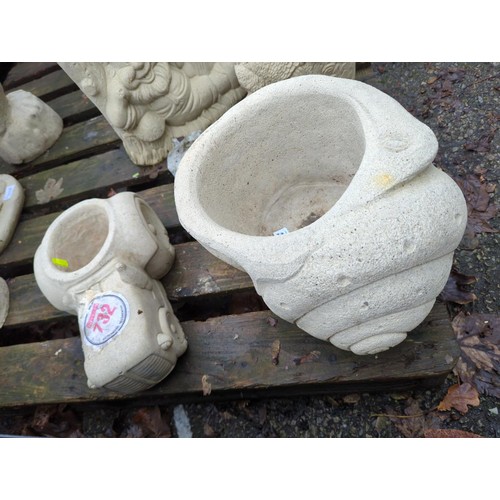 304 - 2x concrete garden planters: Snail & tractor