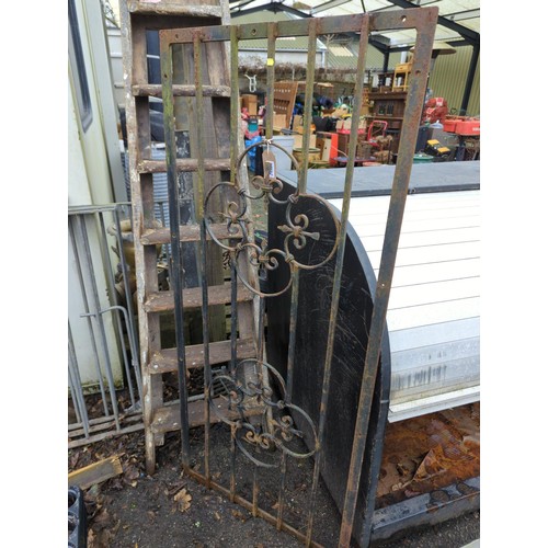 313 - Metal gate. W64.5cm H144cm