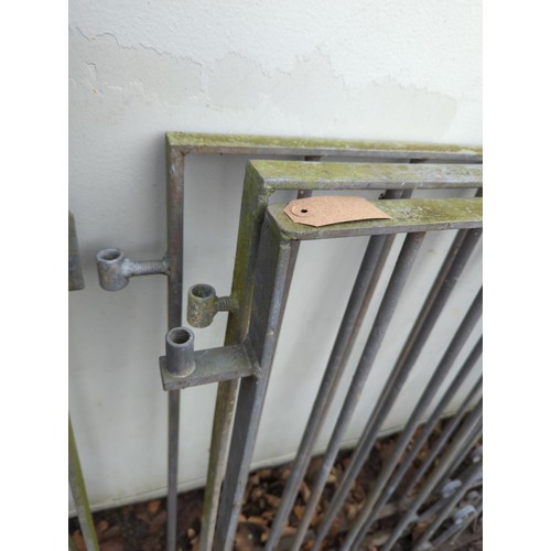 314 - Pair of galvanised scroll metal driveway gates. W126cm (hinge to end). H99cm together with single ga... 