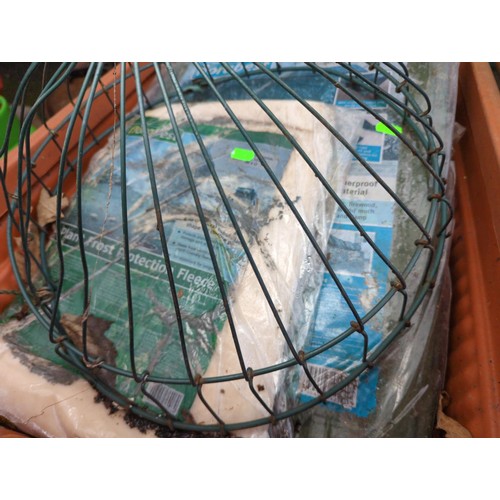 504 - 2 x plastic planters with contents inc tarps, frost fleece, cable ties, waste bags, trimmer cable et... 