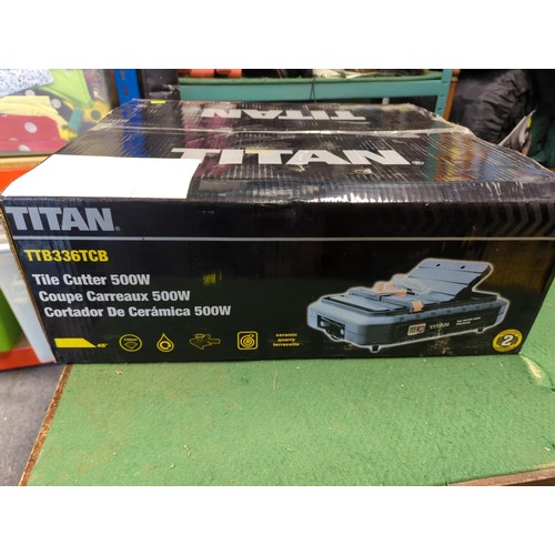 60 - Titan tile cutter. Model TTB336TCB. Appears sealed, new in box. 