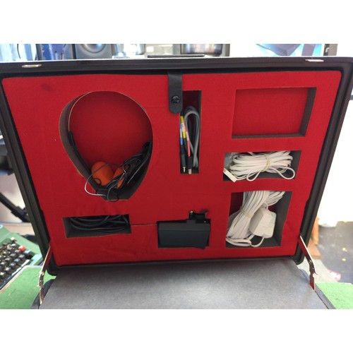 91 - PhoneCoach 3-Way Simulator training equipment in hard case with instructions.