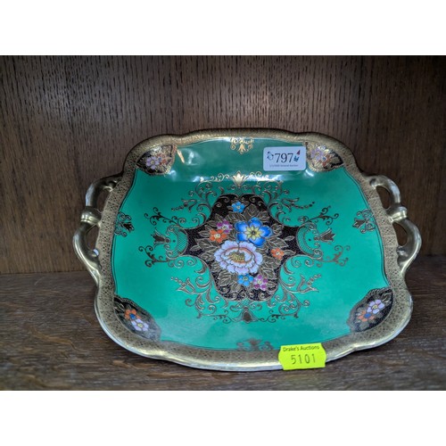 797 - Noritake green ground dish with floral decoration and gilt highlights, 23 x 21cm