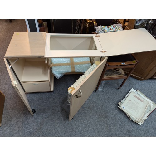 233 - Kensington sewing machine cabinet