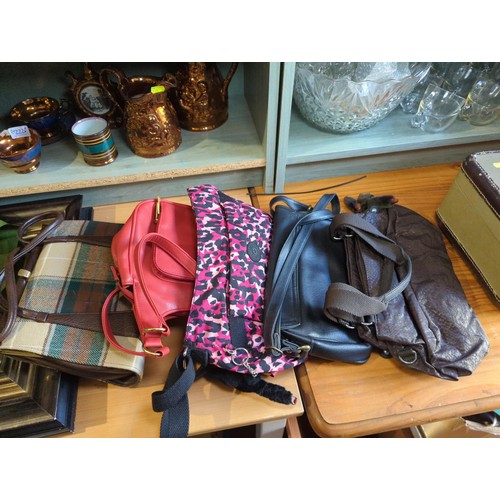 183 - small collection of ladies handbags + small canvas travel bag.