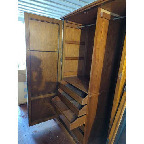 254 - 2 door compactum type wardrobe, with internal shelves and mirror backed door. W125cm D63cm H204cm