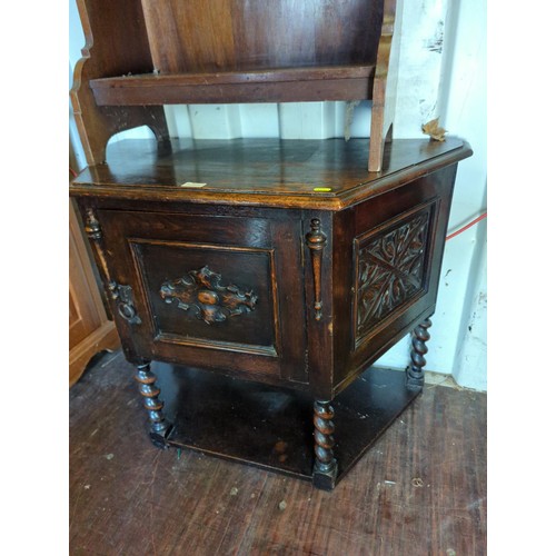 261 - Mid C20 oak credence table, with carved front panels over lower pot shelf. W98cm D45cm H71cm