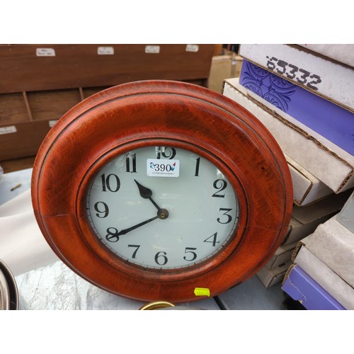 390 - Wooden framed wall clock. D35cm