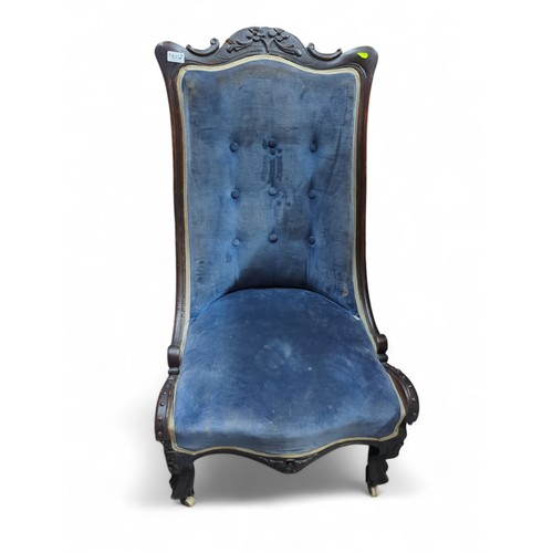 835 - Blue upholstered low bedroom / nursing chair, overall height 96cm