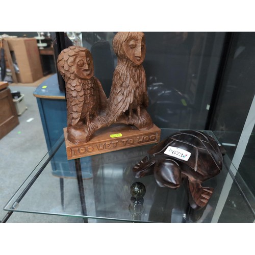 673 - Two carved wooden animals inc. owls and a turtle