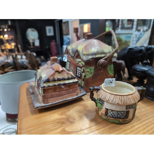 830 - Beswick Ware Y Olde Cottage biscuit barrel, butter dish and sugar bowl